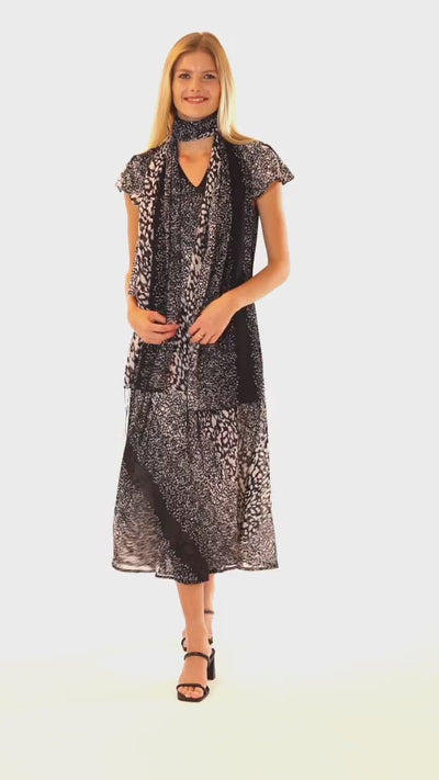 THE SPARKLING REVERSIBLE BLACKISH WHITE DRESS