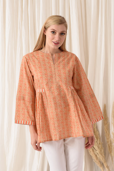 THE PLEATED TOP IN TANGY ORANGE